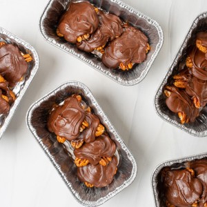 Making Chocolate Turtles couldn't be easier or more fun! They make fabulous gifting and holiday candy.  Homemade pecan turtle candies come together quickly using the microwave to melt the caramel and chocolate.