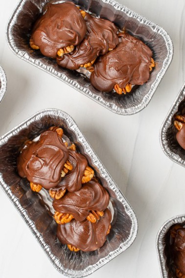 Making Chocolate Turtles couldn't be easier or more fun! They make fabulous gifting and holiday candy.  Homemade pecan turtle candies come together quickly using the microwave to melt the caramel and chocolate.