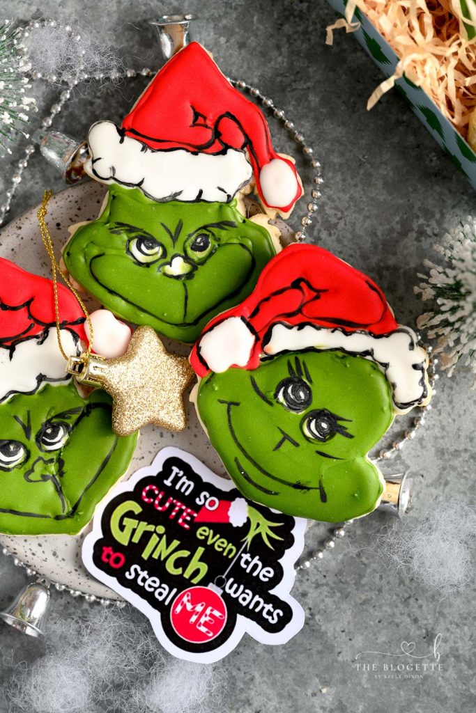 These Grinch Cookies are the ultimate holiday cookie. Made with a traditional sugar cookie base and decorated with icing.