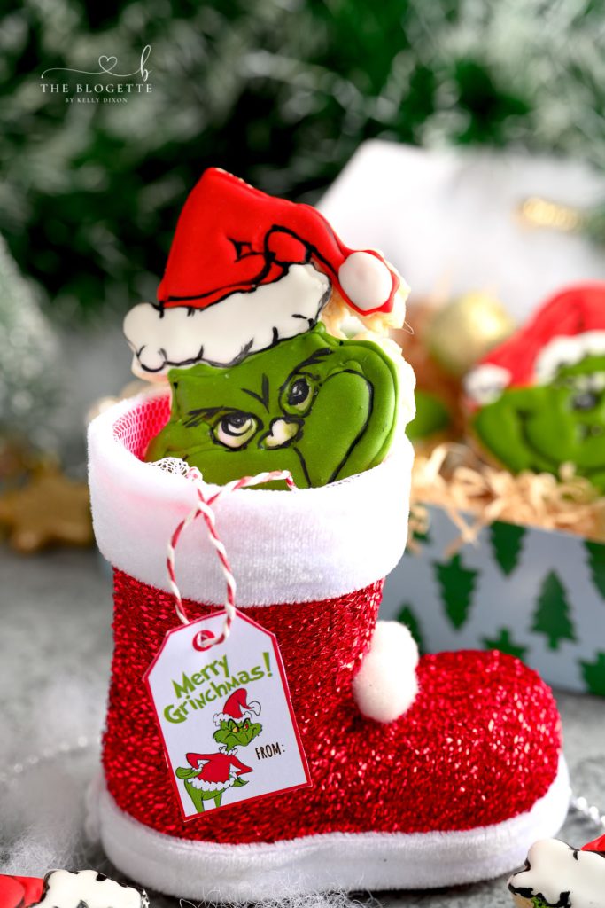 These Grinch Cookies are the ultimate holiday cookie. Made with a traditional sugar cookie base and decorated with icing.
