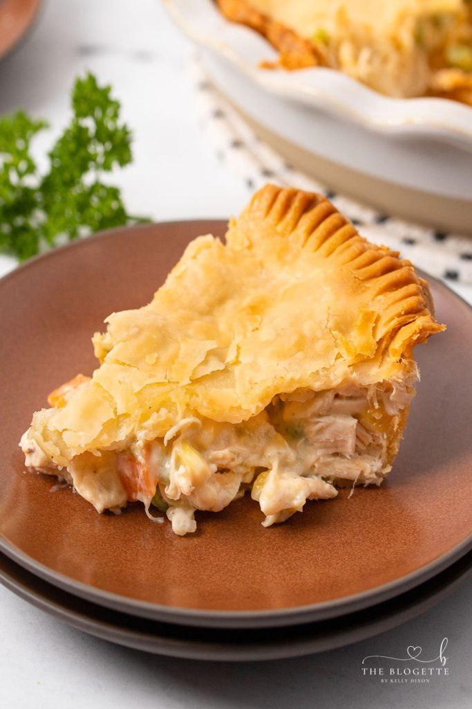 One of the most popular comfort food meals of all time, this Homemade Chicken Pot Pie has a flaky, buttery crust, a creamy sauce, and a deliciously filling mix of chicken and vegetables.
