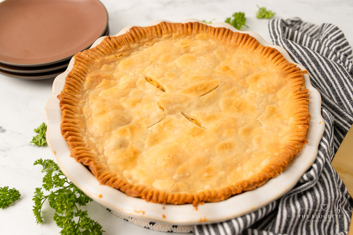 One of the most popular comfort food meals of all time, this Homemade Chicken Pot Pie has a flaky, buttery crust, a creamy sauce, and a deliciously filling mix of chicken and vegetables.