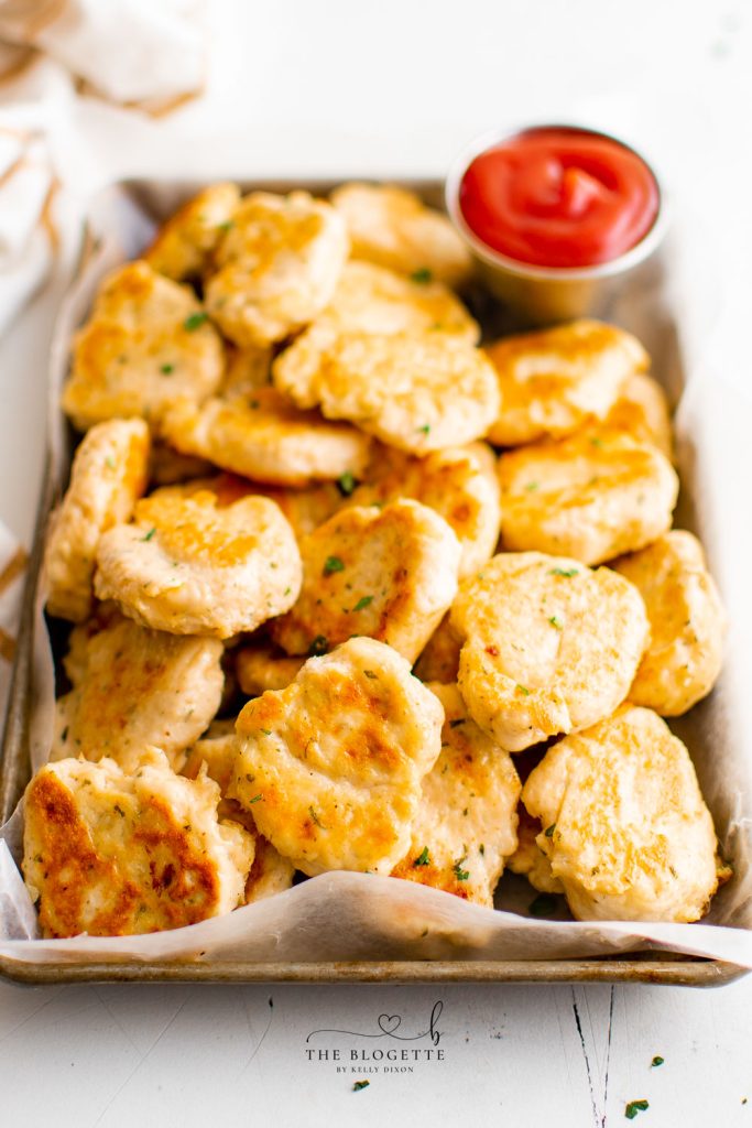 Homemade Chicken Nuggets that are not only healthier than McNuggets, but they're also addicting! Skip the drive-through for chicken McNuggets, because these are the BEST chicken nuggets you can make at home! 