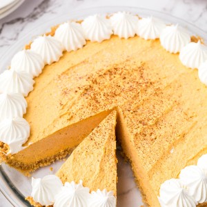 Pumpkin Fluff Pie is a pumpkin cream pie with a graham cracker crust. If you're craving a cold and creamy pumpkin spice treat, this one is for you!
