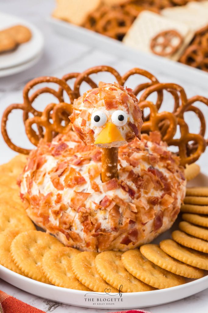 This Bacon Ranch Turkey Cheeseball will be a hit at the holiday table! This is a Thanksgiving appetizer you MUST add to your menu!