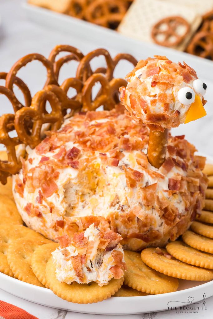 This Bacon Ranch Turkey Cheeseball will be a hit at the holiday table! This is a Thanksgiving appetizer you MUST add to your menu!