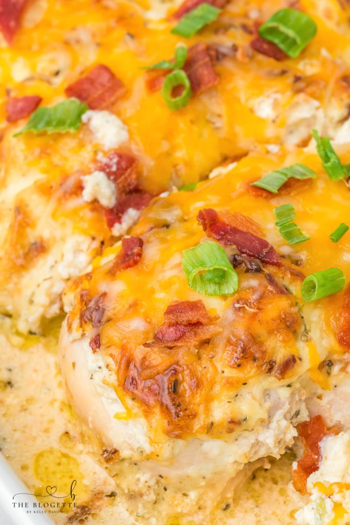 This Million Dollar Chicken recipe is easy, cheesy, and smothered in a special cream sauce, then topped with bacon!