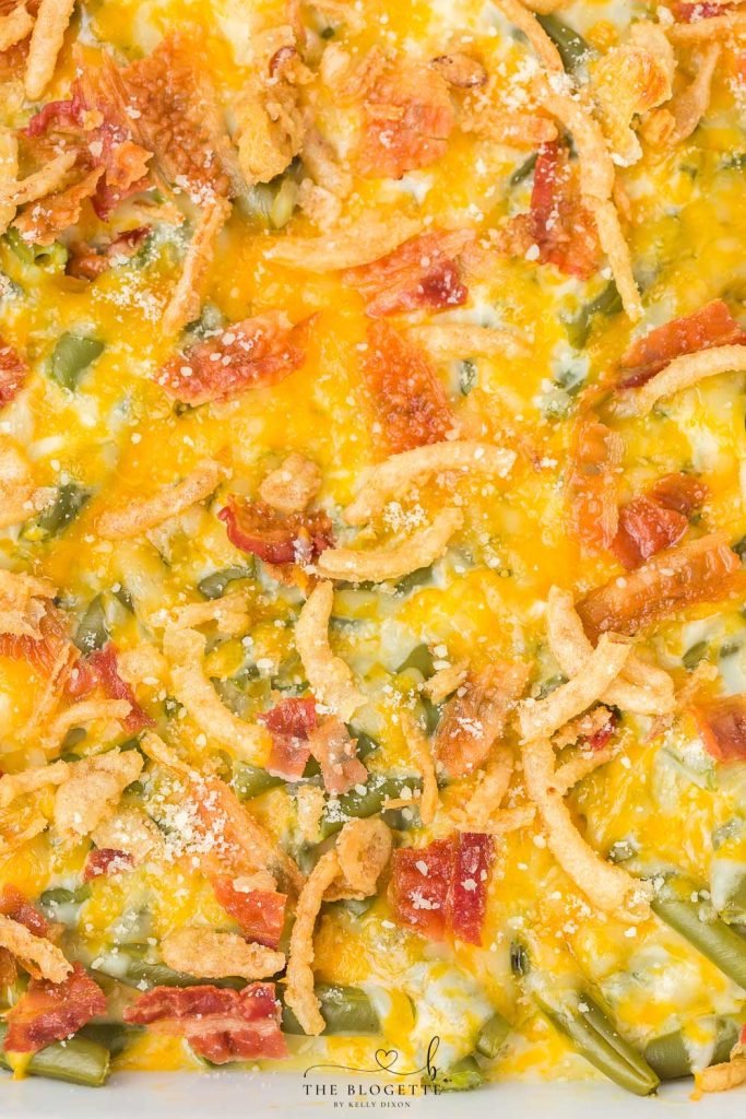 A creamy and Cheesy Green Bean Casserole with Bacon will be a hit on your holiday table. A must-have recipe for Thanksgiving and Christmas!