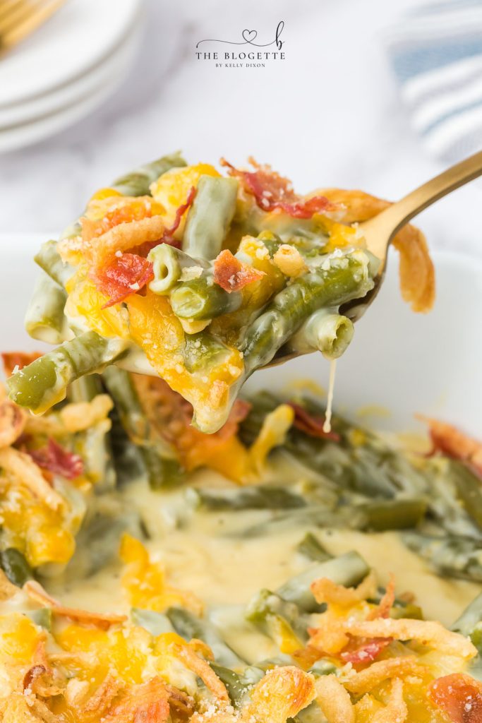 A creamy and Cheesy Green Bean Casserole with Bacon will be a hit on your holiday table. A must-have recipe for Thanksgiving and Christmas! 