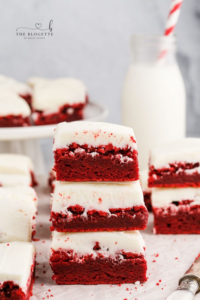 These red velvet cookie bars have a light crunchy outside with a soft and chewy inside making them the perfect balance! 