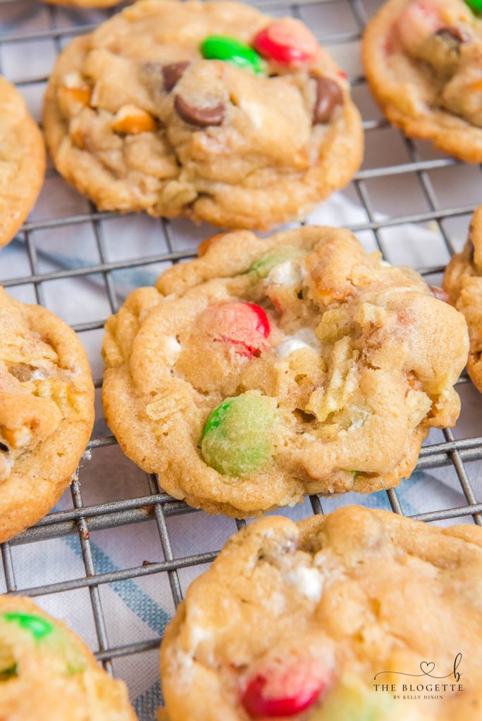Kitchen Sink Christmas Cookies are sweet-and-salty, chewy-and-gooey cookies with M&M's, chocolate chips, pretzels, marshmallows, potato chips... everything but the kitchen sink!