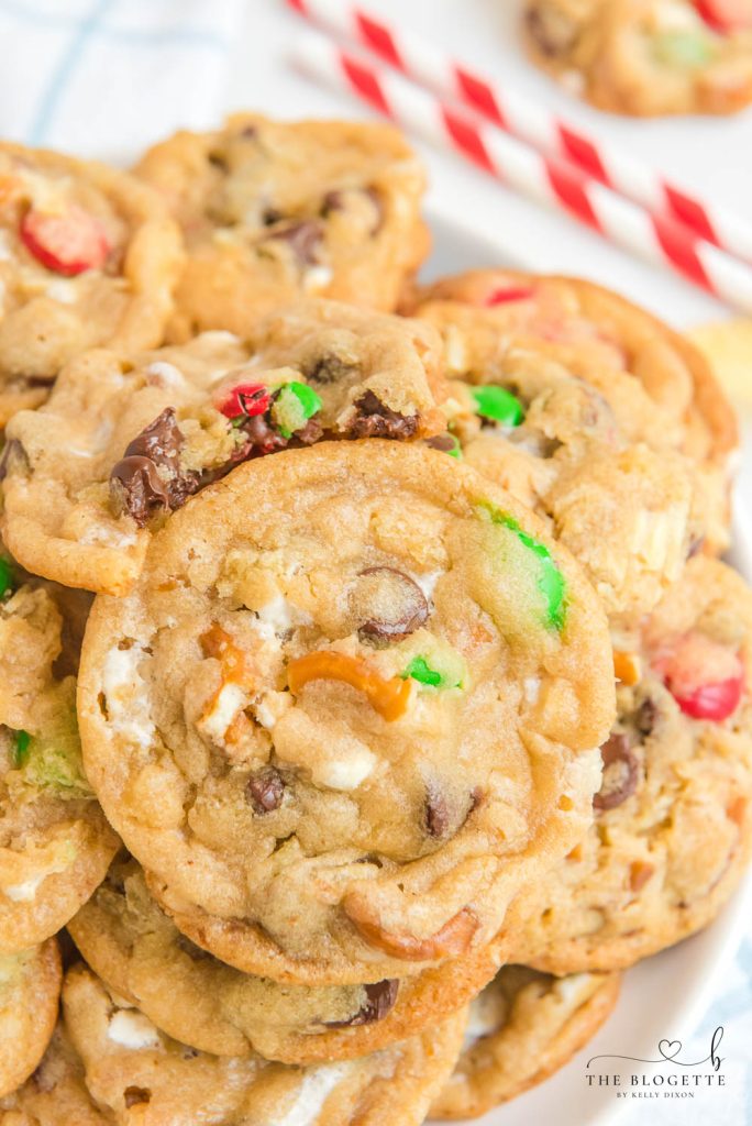 Kitchen Sink Christmas Cookies are sweet-and-salty, chewy-and-gooey cookies with M&M's, chocolate chips, pretzels, marshmallows, potato chips... everything but the kitchen sink! 