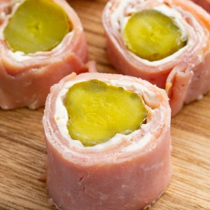 Ham and Pickle Roll Ups are one of the best appetizers ever! Ham, cream cheese, and pickles rolled up into a tasty easy appetizer.