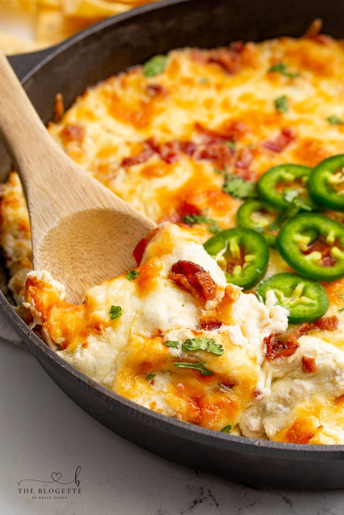 Jalapeño Popper Dip is the best hot cheese dip ever! This tasty Appetizer is perfect for parties, game days, or tailgating.