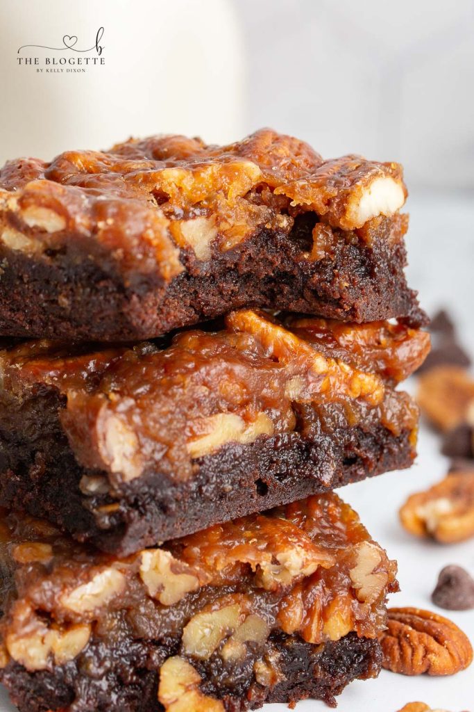 Pecan Pie Brownies are fudgy chocolate brownies topped with a pecan pie filling for an irresistible dessert. This is a Thanksgiving FAVORITE but is delicious all year long.