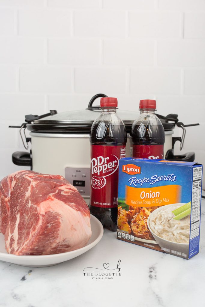 Dr. Pepper Pulled Pork made in a slow cooker is easy, tender, and delicious. Everything you love about sweet and savory pulled pork, but when it's flavored with Dr. Pepper, it makes every single bite melt in your mouth!