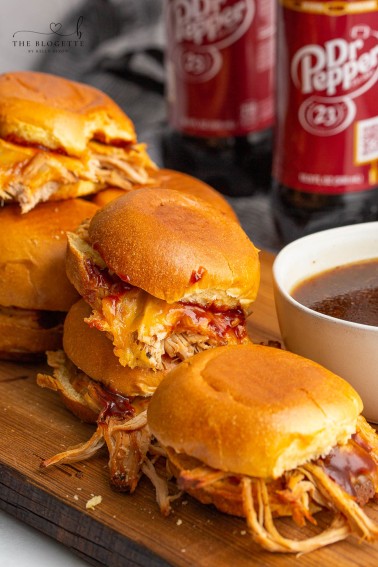 Dr. Pepper Pulled Pork made in a slow cooker is easy, tender, and delicious. Everything you love about sweet and savory pulled pork, but when it's flavored with Dr. Pepper, it makes every single bite melt in your mouth!