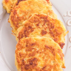 Potato Pancakes are fluffy and cheesy pancakes made with mashed potatoes and pan-fried to crispy golden brown perfection.
