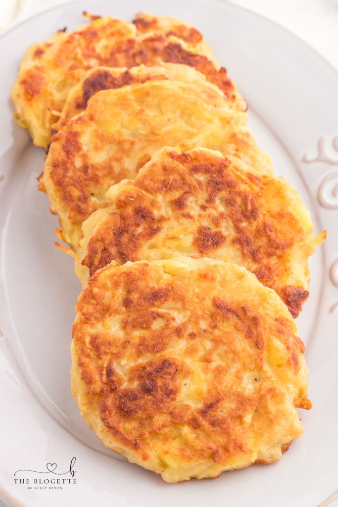 Potato Pancakes are fluffy and cheesy pancakes made with mashed potatoes and pan-fried to crispy golden brown perfection.