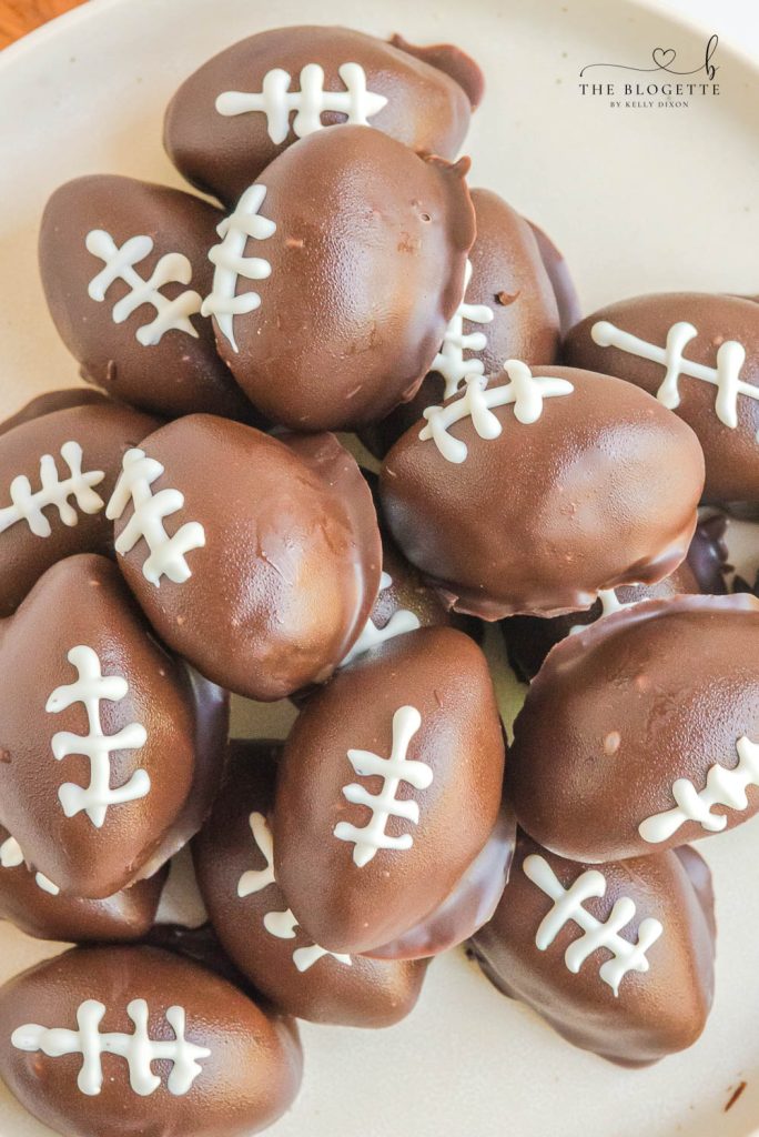 Oreo Football Truffles are perfect for the Super Bowl, Tailgating Parties, or even just to snack on during the game! Only 5 ingredients!
