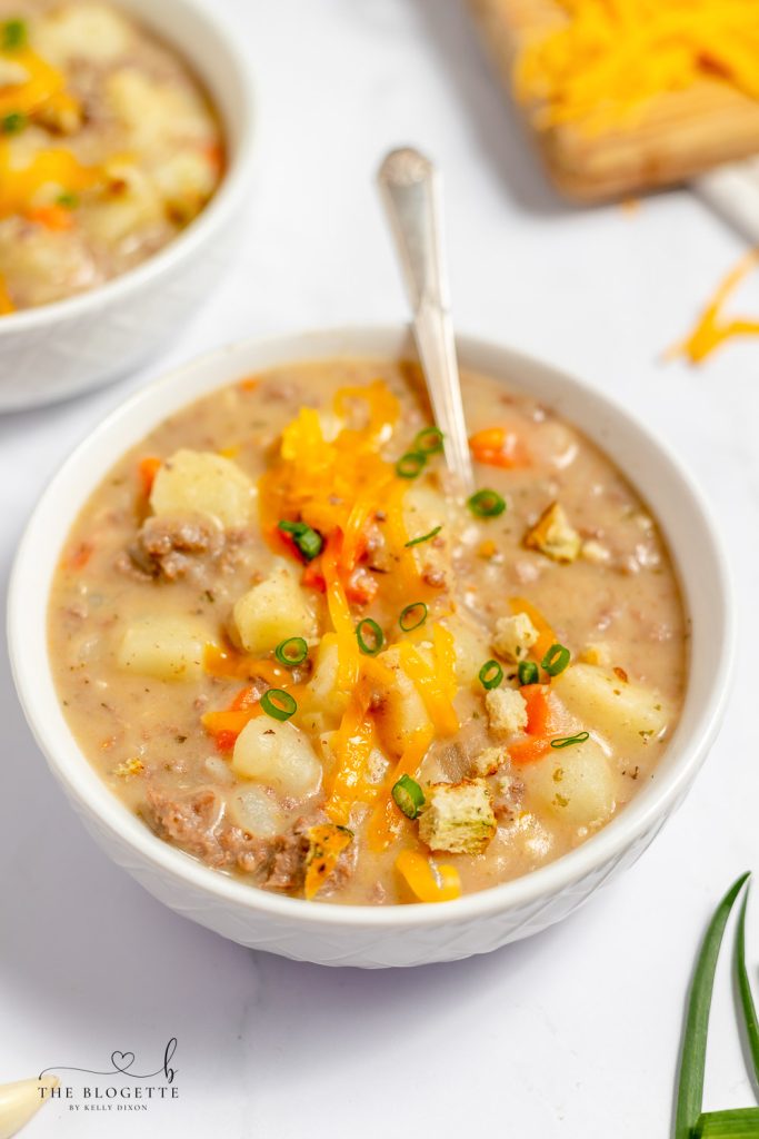 Cheeseburger Soup Recipe - Loaded with ground beef, cheese, potatoes, and creamy broth, this is a soup recipe you need to always keep on hand!