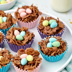 Chocolate Egg Nests made with cornflakes are the perfect Easter treat! This an easy, no-bake Easter dessert idea that kids can help make.