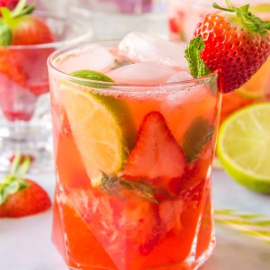 A Strawberry Mojito is a gorgeous, yet, simple twist on a traditional mojito! Prepared with strawberries, rum, lime, simple syrup, and mint, this sunny weather drink is easy enough for anyone to make