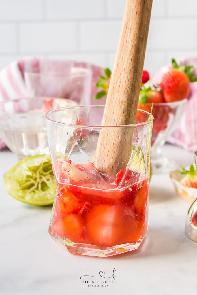 Muddled strawberries with rum and mint