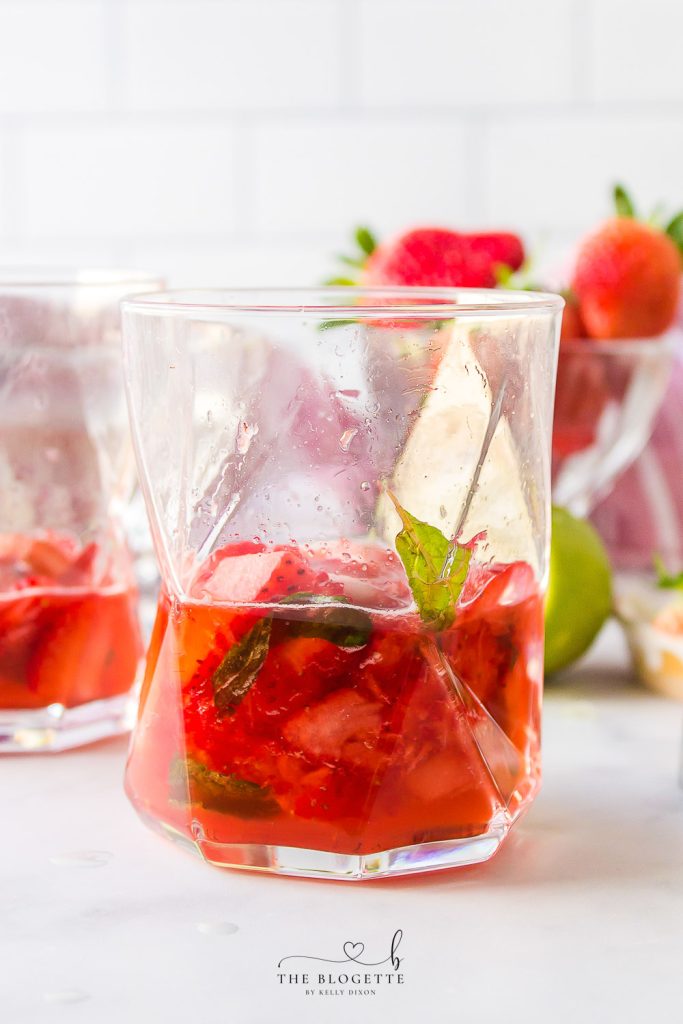 Muddled strawberries with rum and mint