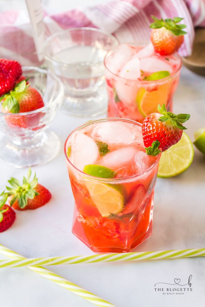 A Strawberry Mojito is a gorgeous, yet, simple twist on a traditional mojito! Prepared with strawberries, rum, lime, simple syrup, and mint, this sunny weather drink is easy enough for anyone to make