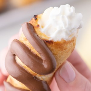 Decadent Campfire Éclairs are the perfect camping recipe and are sure to be the highlight of your summer camping trip!