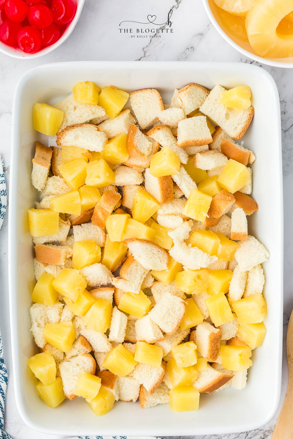 Pineapple mixture over bread in baking dish