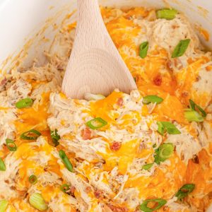 Crock Pot Crack Chicken is a heavenly dish featuring everyone's favorite chicken breasts, cream cheese, ranch seasoning, and bacon!