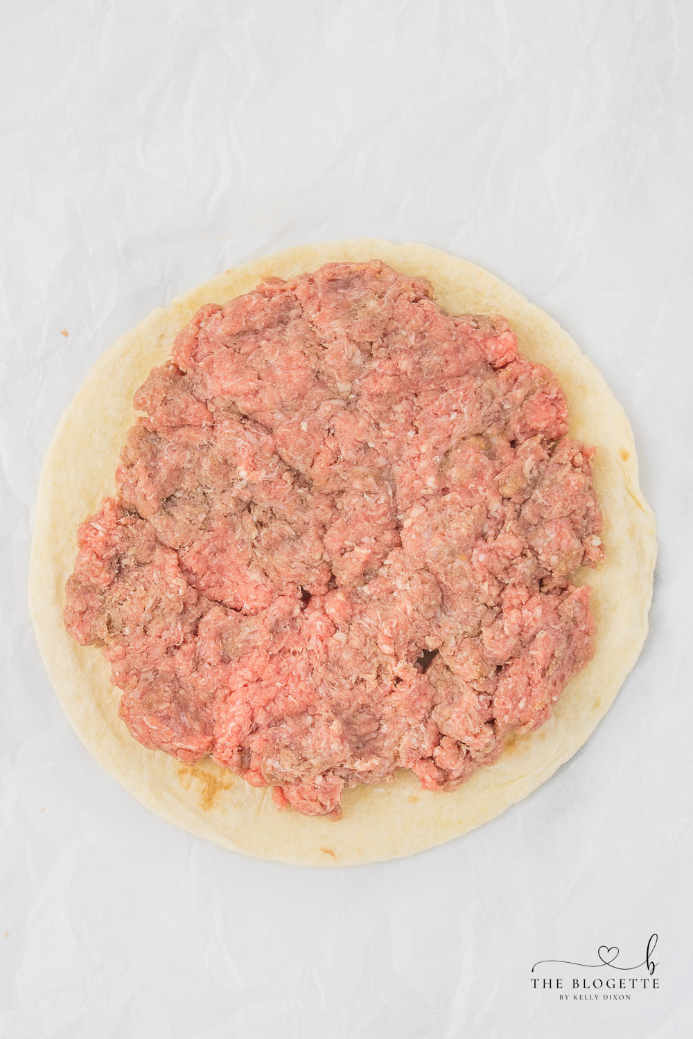 Ground beef patty with a tortilla