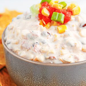 Creamy Fiesta Ranch Dip is an addicting chip dip that everyone looks forward to at parties! Served with your favorite chips.