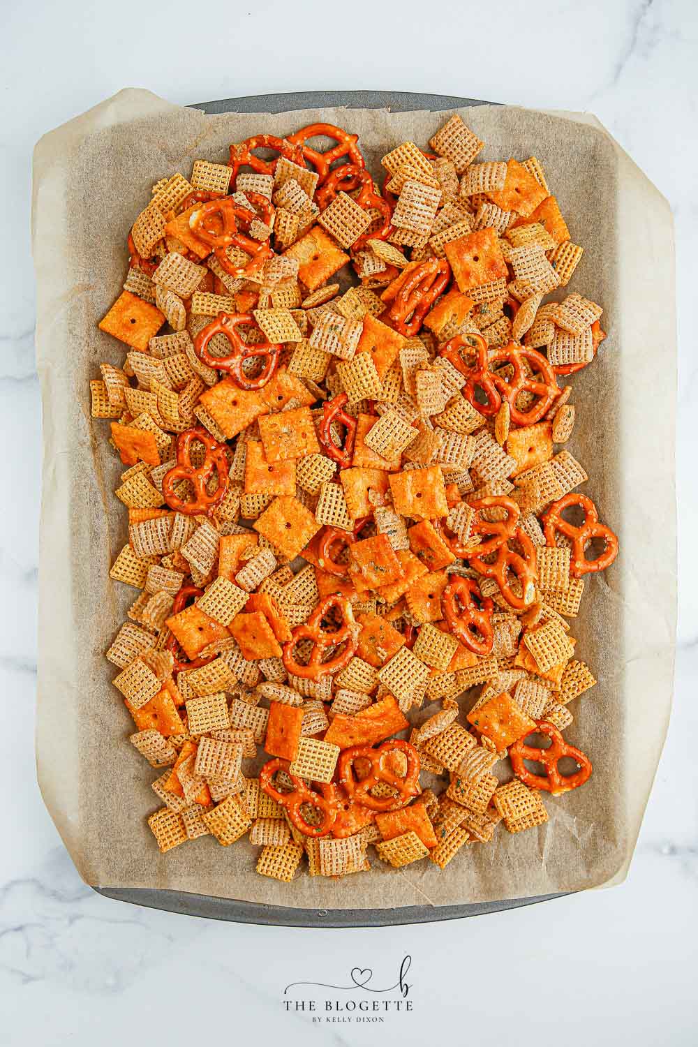 Mix on baking tray with parchment paper