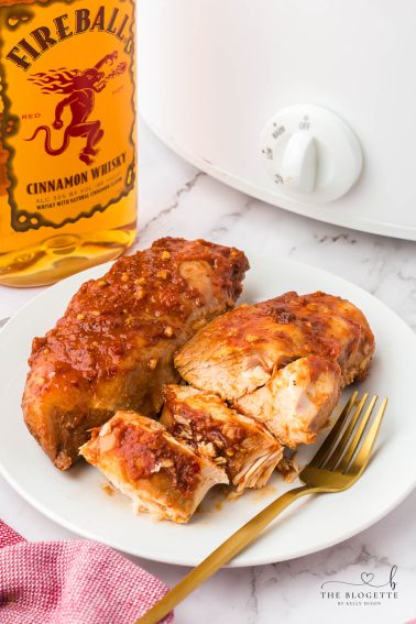 Crock Pot Fireball Chicken - a flavorful slow cooker chicken seasoned with a homemade Fireball-flavored sauce! The whiskey sauce makes the chicken so juicy and delicious.