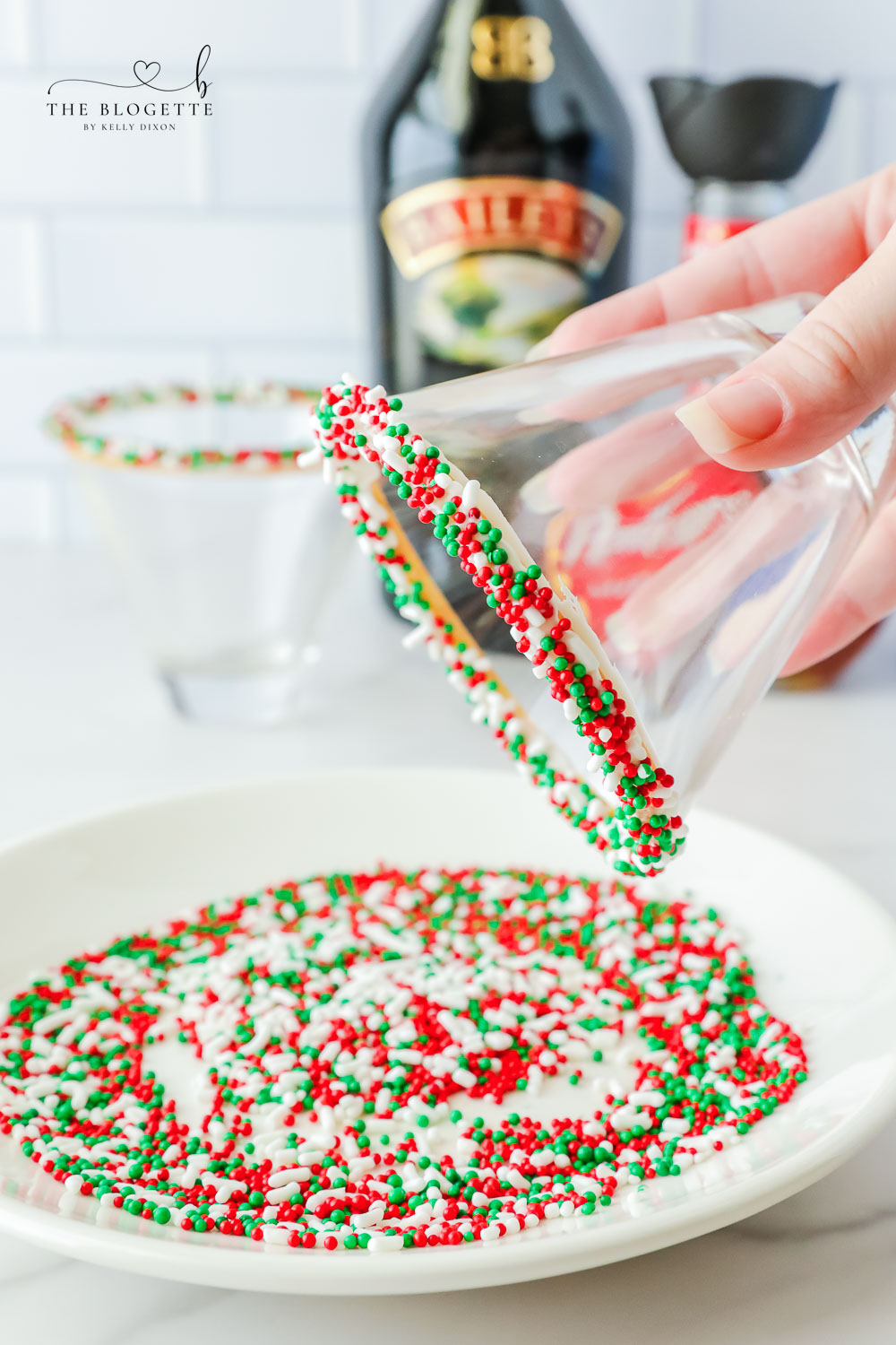 Adding sprinkles to the rim of a cup