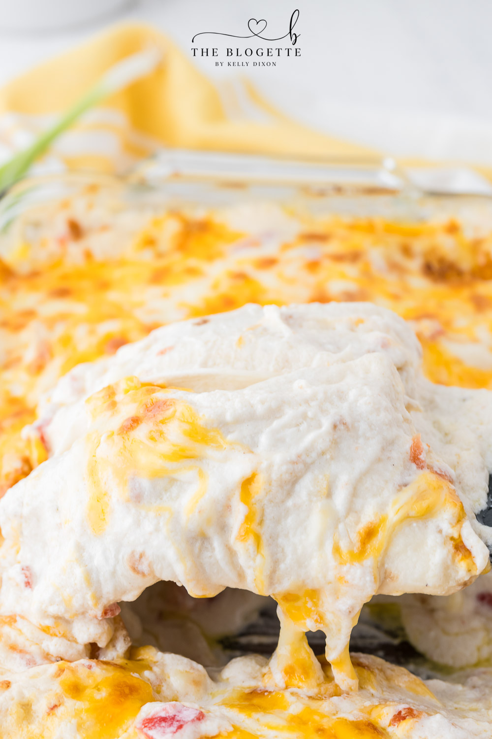 Creamy White Chicken Enchiladas made with flour tortillas, shredded chicken, cheese, sour cream, and more!