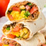 These delicious, hearty breakfast burritos are easy to scarf down! They are great for meal-prep to freeze and bake later.