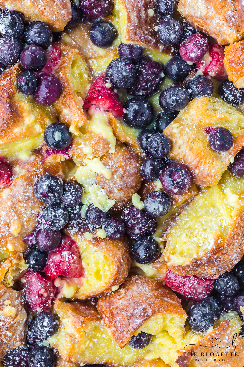 Berry Croissant Bake with layers of croissants, fresh berries, and a creamy custard.