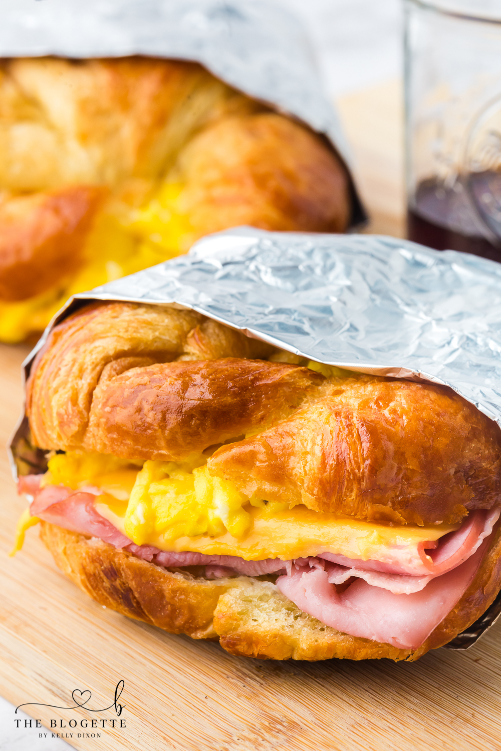 Croissant Breakfast Sandwiches are the ultimate breakfast comfort! Buttery flakey bread stuffed with eggs, ham, and melted cheese. 
