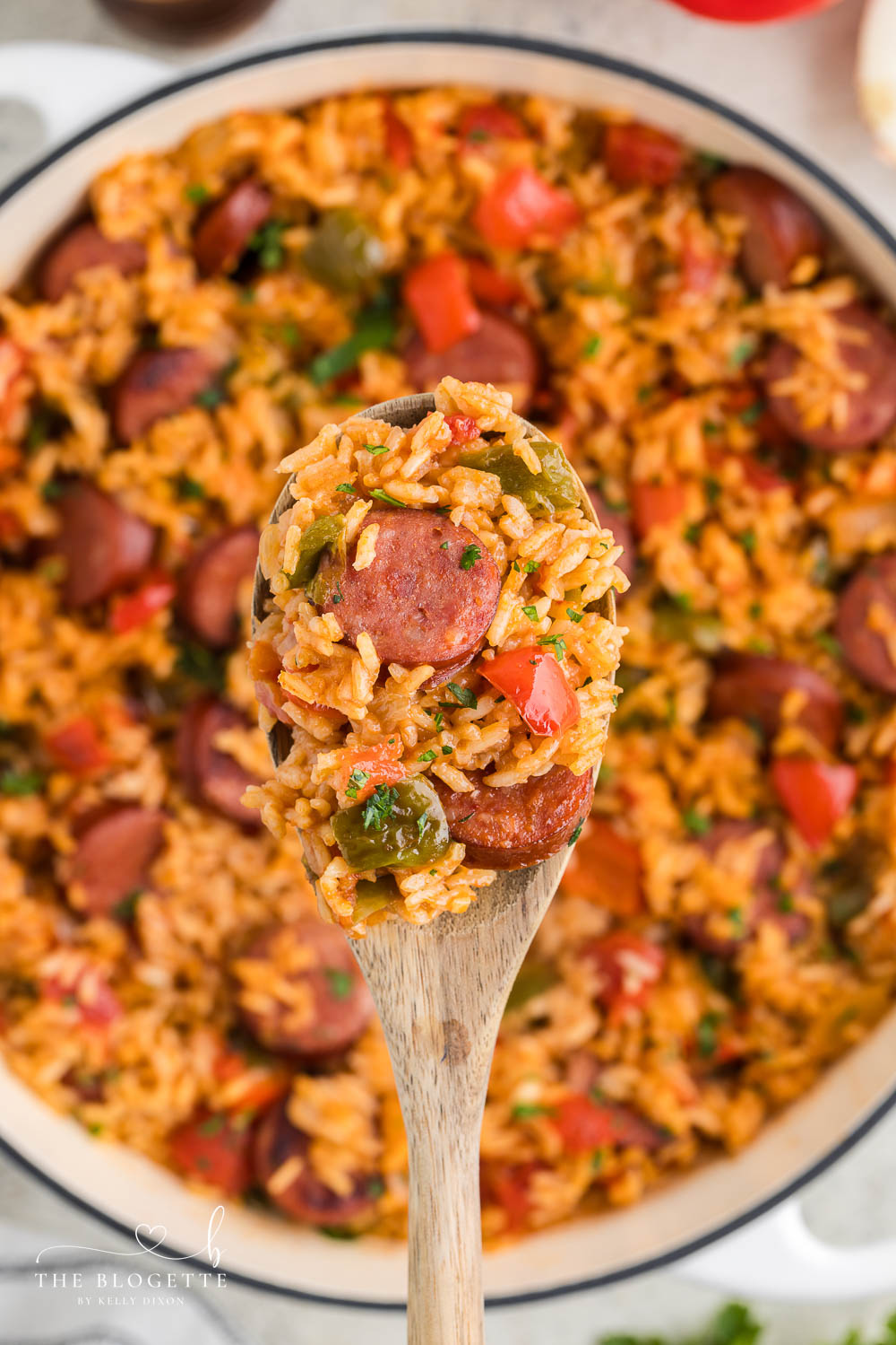 This Sausage and Rice Skillet features smoky sausage sizzled with sweet bell pepper, onions, and garlic in vibrant tomato sauce.