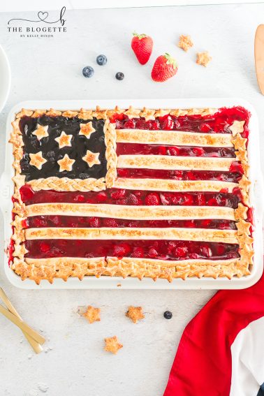 An easy-to-make American Flag Pie made with strawberry and blueberry pie filling with a golden sugared pie crust. A 4th of July Dessert!