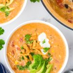 This Chicken Enchilada Soup is thick, creamy, cheesy, and ready to go in just 20 minutes! It can be made on the stove top or crock-pot. EASY!