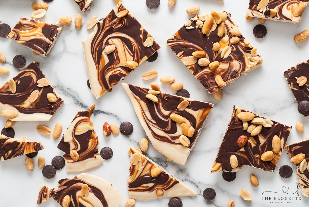 Snickers Frozen Bark is everything you love about the flavors of a Snickers Bar! Chocolate, caramel, peanuts, and thick frozen yogurt.