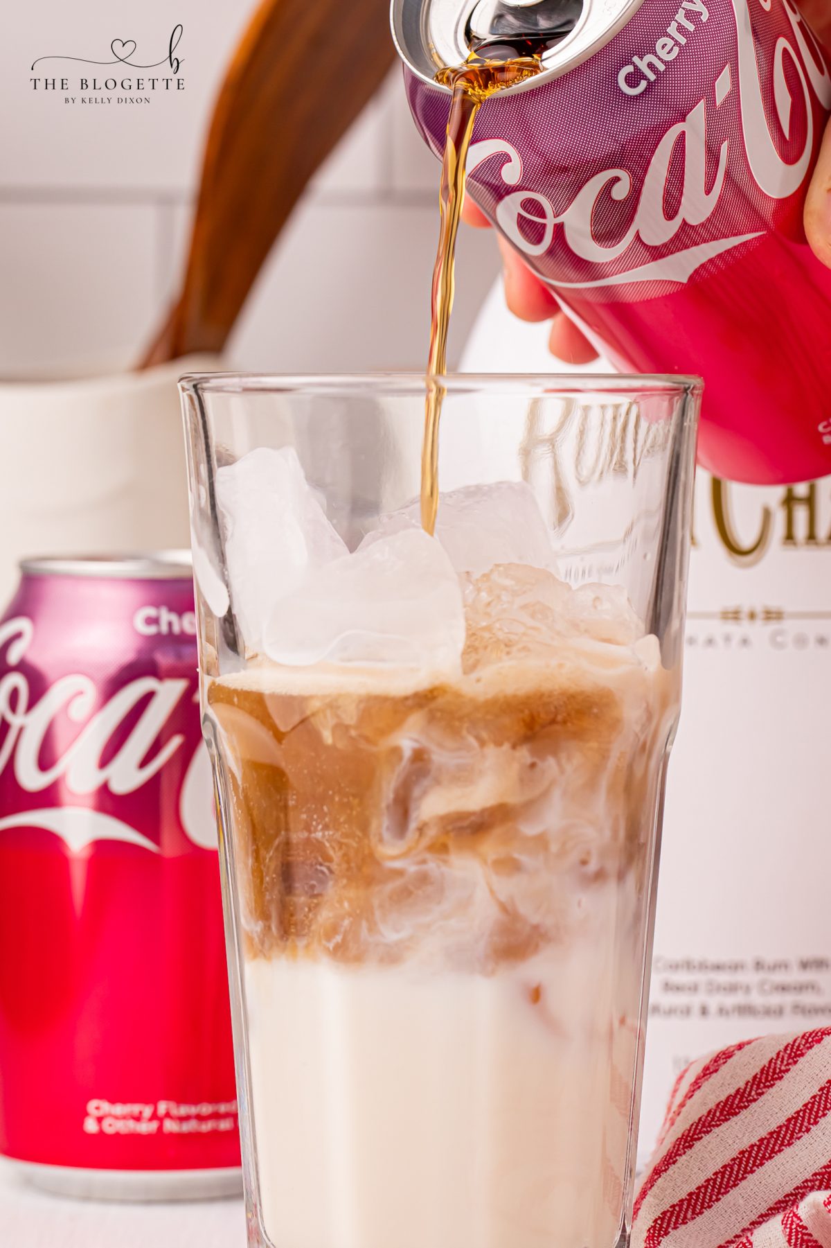 Slowly add Cherry Coca-Cola