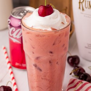 A creamy cherry cola cocktail made with just 2 ingredients! This sweet, easy RumChata drink is perfect for parties, girls’ nights, and holiday hosting.