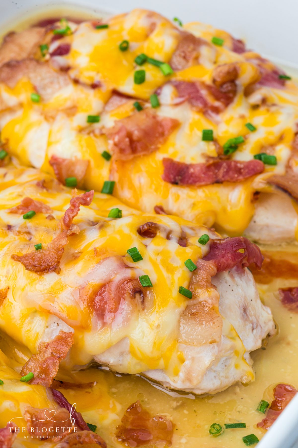 This easy chicken bacon ranch recipe is made with juicy baked chicken, creamy ranch dressing, crispy bacon, and melted cheese. A simple dinner idea the whole family will love, perfect for busy weeknights or meal prep.