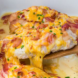 This easy chicken bacon ranch recipe is made with juicy baked chicken, creamy ranch dressing, crispy bacon, and melted cheese. A simple dinner idea the whole family will love, perfect for busy weeknights or meal prep.